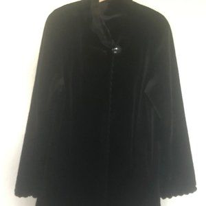 Mink jacket with fancy trimmed sleeves and closing.  Sheared mink, very soft